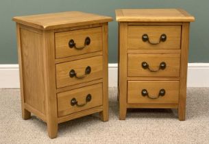 PAIR OF MODERN OAK THREE-DRAWER BEDSIDE CHEST with swing pull handles, 57.5cms H, 40cms W, 35cms D