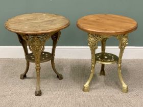 TWO CAST IRON PUB TABLES WITH CIRCULAR TOPS, one vintage, and one reproduction, 70cms H, 65cms top