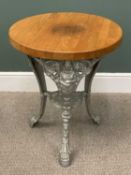 REPRODUCTION CAST IRON BRITANNIA PUB TABLE with butcher's type block circular top, 72cms H, 59.