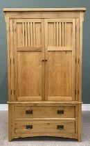 MODERN OAK WARDROBE with twin upper doors over two lower opening drawers, with metal back plates and