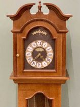 WESTMINSTER GERMANY MAHOGANY CASED GRANDMOTHER CLOCK, having individual white enamel indicators