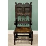 ANTIQUE GOTHIC CARVED OAK ARMCHAIR, shaped crest-rail with floral carving, the Roman numerals XIII