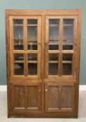 LATE VICTORIAN PITCH PINE HOUSEKEEPER'S CUPBOARD, with twin glazed upper doors and adjustable