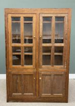 LATE VICTORIAN PITCH PINE HOUSEKEEPER'S CUPBOARD, with twin glazed upper doors and adjustable