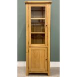 NARROW MODERN OAK STANDING CORNER CUPBOARD with glazed upper door and panelled lower door, both