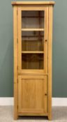 NARROW MODERN OAK STANDING CORNER CUPBOARD with glazed upper door and panelled lower door, both