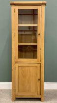 NARROW MODERN OAK STANDING CORNER CUPBOARD with glazed upper door and panelled lower door, both