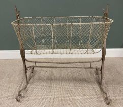 ANTIQUE WIREWORK CRADLE ON A WROUGHT IRON STAND, 92cms H, 94cms max. W, 61cms max. D Provenance: