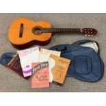 DULCET CLASSIC MODERN SPANISH GUITAR IN SOFT CARRY CASE, with a quantity of music sheet books,