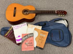 DULCET CLASSIC MODERN SPANISH GUITAR IN SOFT CARRY CASE, with a quantity of music sheet books,