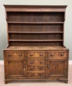 NORTH WALES OAK WELSH DRESSER CIRCA 1850, with a wide boarded back three shelf rack, on a panel