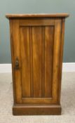 VINTAGE SATIN WALNUT SINGLE-DOOR BEDSIDE CABINET with interior shelf, on a plinth base, 75.5cms H,