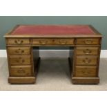 EDWARDIAN MAHOGANY TWIN PEDESTAL DESK with gilt tooled red leather insert to the top, over three