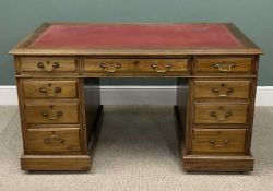 EDWARDIAN MAHOGANY TWIN PEDESTAL DESK with gilt tooled red leather insert to the top, over three