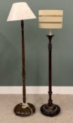 TWO VINTAGE & REPRODUCTION WOODEN STANDARD LAMPS, both having detail to the columns, on circular