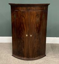 ANTIQUE MAHOGANY BOWFRONTED WALL HANGING CORNER CUPBOARD, 108cms H, 75cms W, 53cms D Provenance: