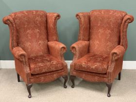 PAIR OF REPRODUCTION WINGBACK ARMCHAIRS, classically upholstered, 120cms H, 93cms W, 54cms D