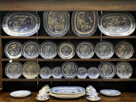 BLUE & WHITE WILLOW PATTERNED HARLEQUIN DRESSER SET forty-two pieces to include 8 x meat platters,