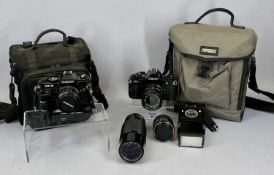 CANON A-1 SLR CAMERA with Canon zoom lens FD35-70mm, Canon zoom lens FD70-210mm, Canon lens FD1.2.