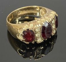 9CT YELLOW GOLD RING set with three graduated garnets, size L, 4.5g Provenance: deceased estate