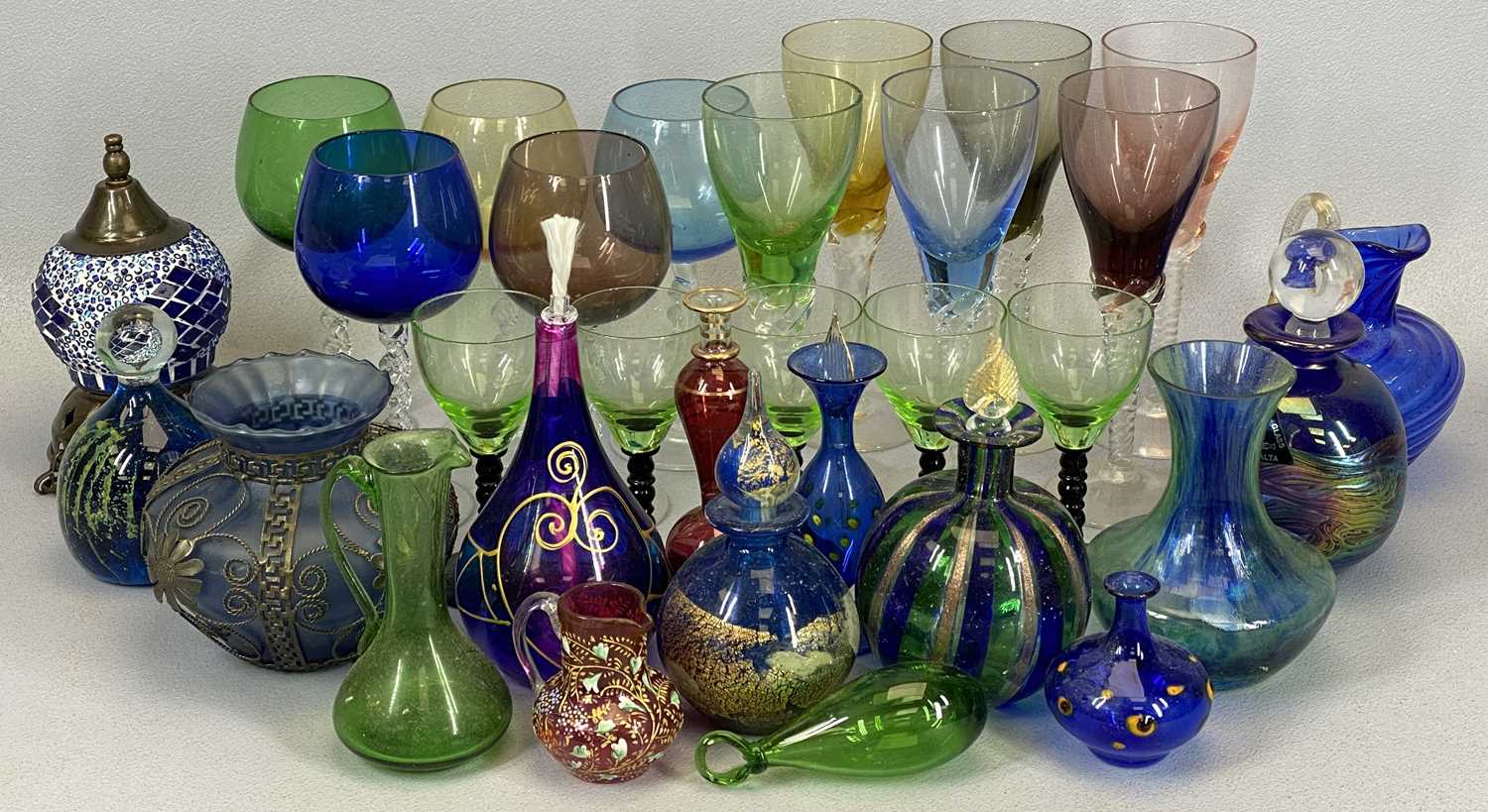 MIXED COLOURED GLASSWARE including scent bottles, paperweights, liqueur glasses and other items