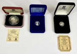 THREE POBJOY MINT LIMITED EDITION COMMEMORATIVE COINS, sealed in presentation cases with