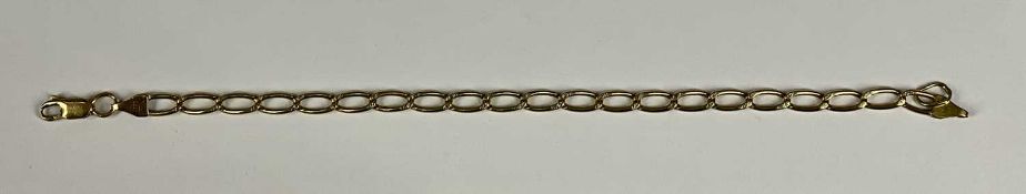 YELLOW METAL CHAIN LINK BRACELET with lobster clasp, marked '750', 19cms L, 7.7g Provenance: