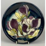 MOORCROFT 'MAGNOLIA' PATTERN CIRCULAR SHALLOW DISH , impressed marks and monogrammed W M for