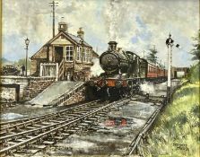 BERNARD R JONES (British, 20th Century) oil on canvas - steam train at station, titled verso '