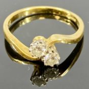 18CT YELLOW GOLD TWO-STONE DIAMOND CROSSOVER RING, the diamonds approx. 0.40ct, size N, 2.6g