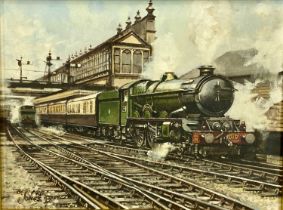 BERNARD R JONES (British, 20th Century) oil on canvas - steam train at station, titled verso 'King