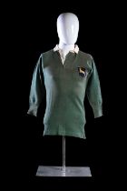 A RARE 1906 SOUTH AFRICA INTERNATIONAL SPRINGBOK RUGBY UNION MATCH-WORN JERSEY In moss-green