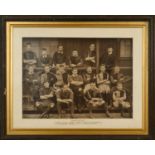 A PERIOD FRAMED BLACK & WHITE PHOTOGRAPH OF THE NEWPORT RUGBY TEAM IN 1886-87 The team informally