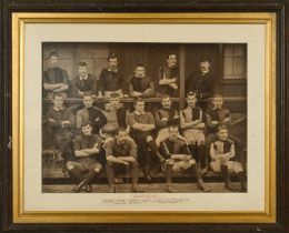 A PERIOD FRAMED BLACK & WHITE PHOTOGRAPH OF THE NEWPORT RUGBY TEAM IN 1886-87 The team informally
