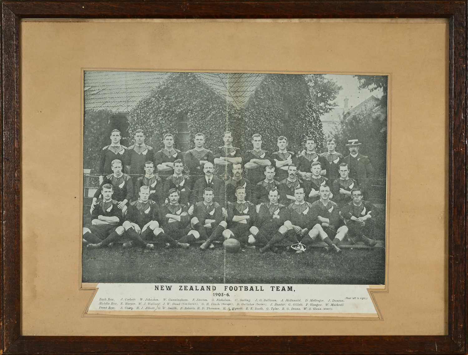 A PERIOD FRAMED BLACK & WHITE PHOTOGRAPH ENTITLED ‘NEW ZEALAND FOOTBALL...