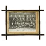 A PERIOD FRAMED BLACK & WHITE PHOTOGRAPH ENTITLED ‘THE WELSH TEAM WHICH DEFEATED NEW ZEALAND DEC