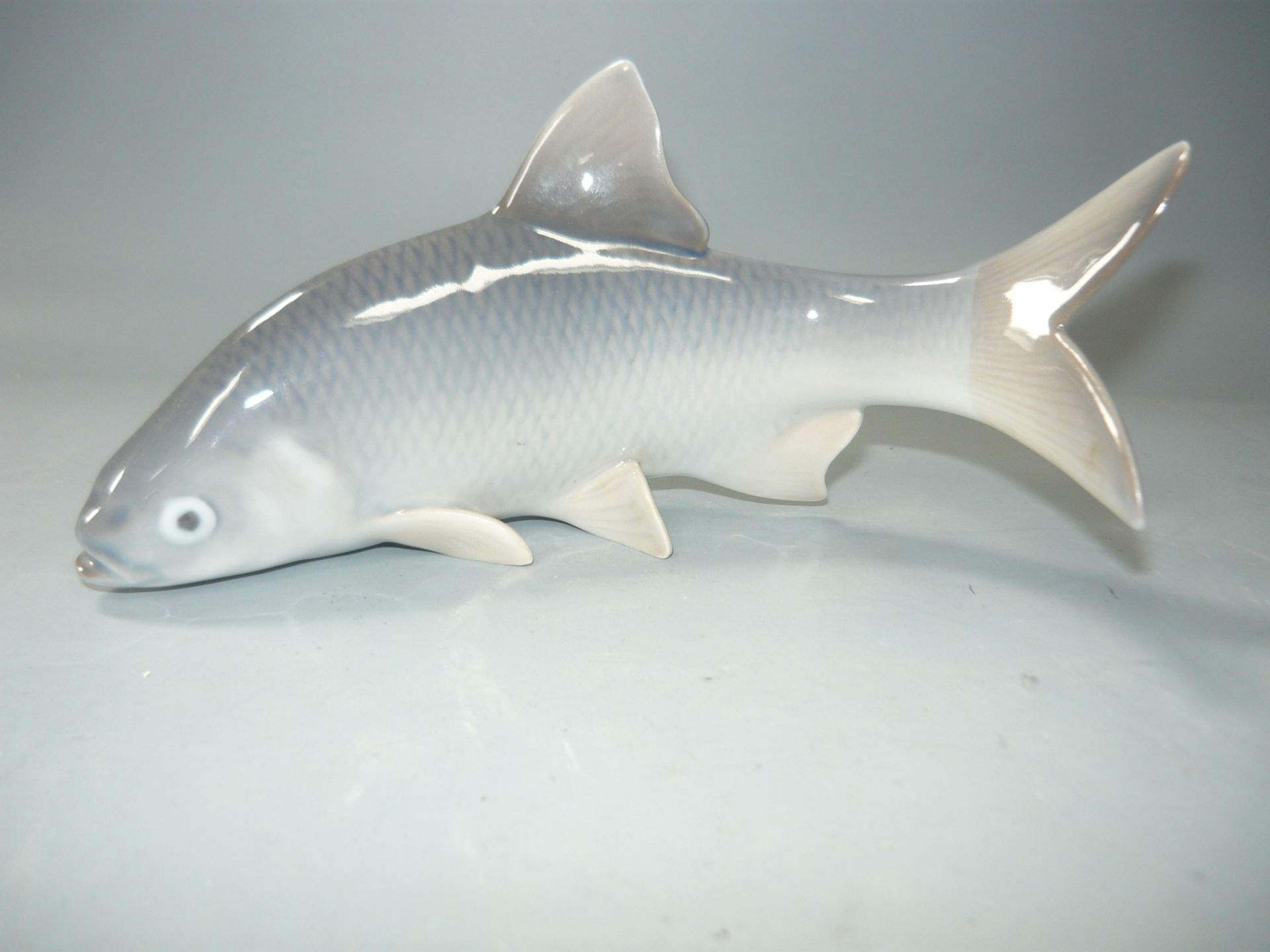 Royal Copenhagen. Fisch. Erste Wahl. L. 15cm. //English: Royal Copenhagen. Fisch. First choice.