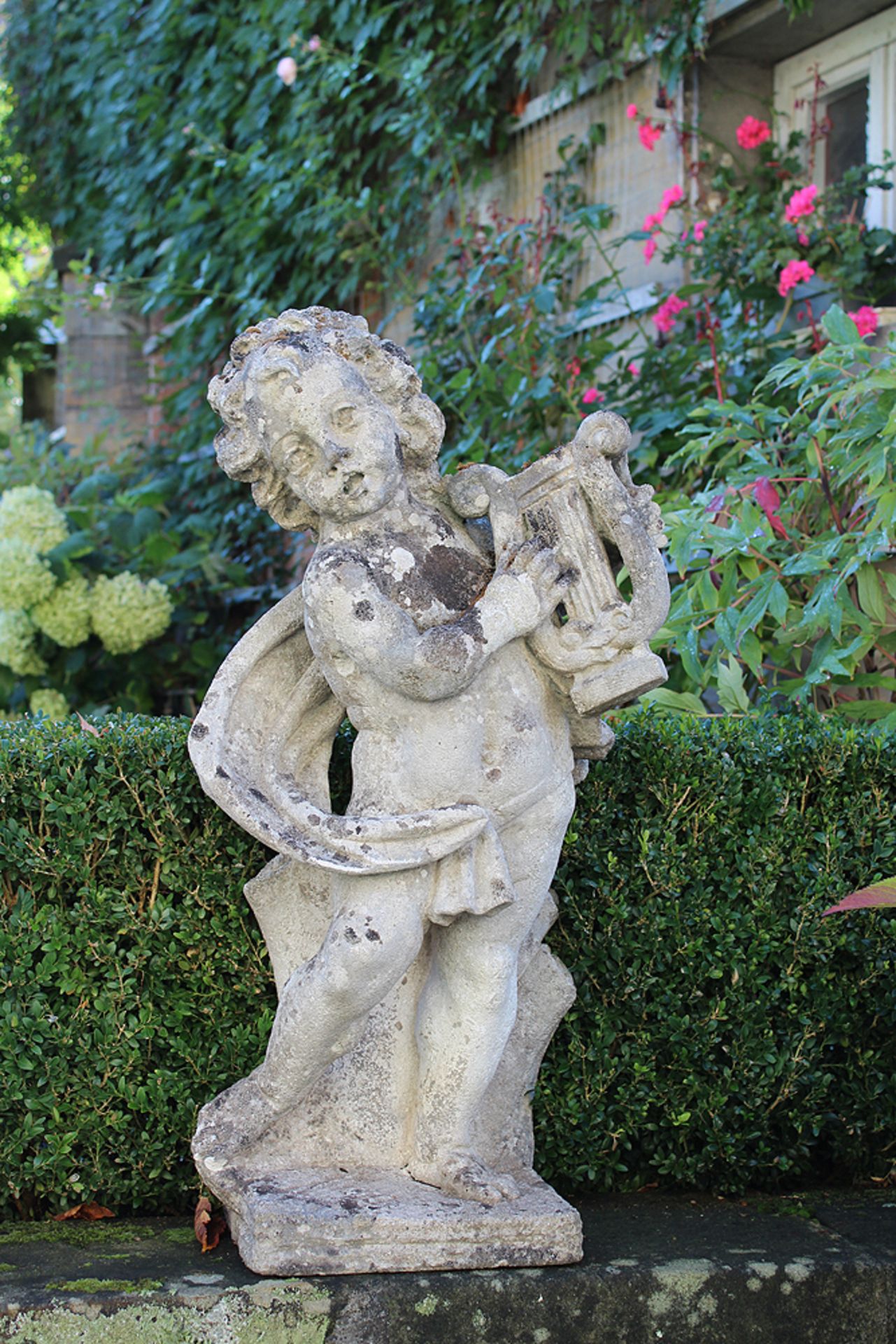 Gartenskulptur. Nach 1900. Putto mit