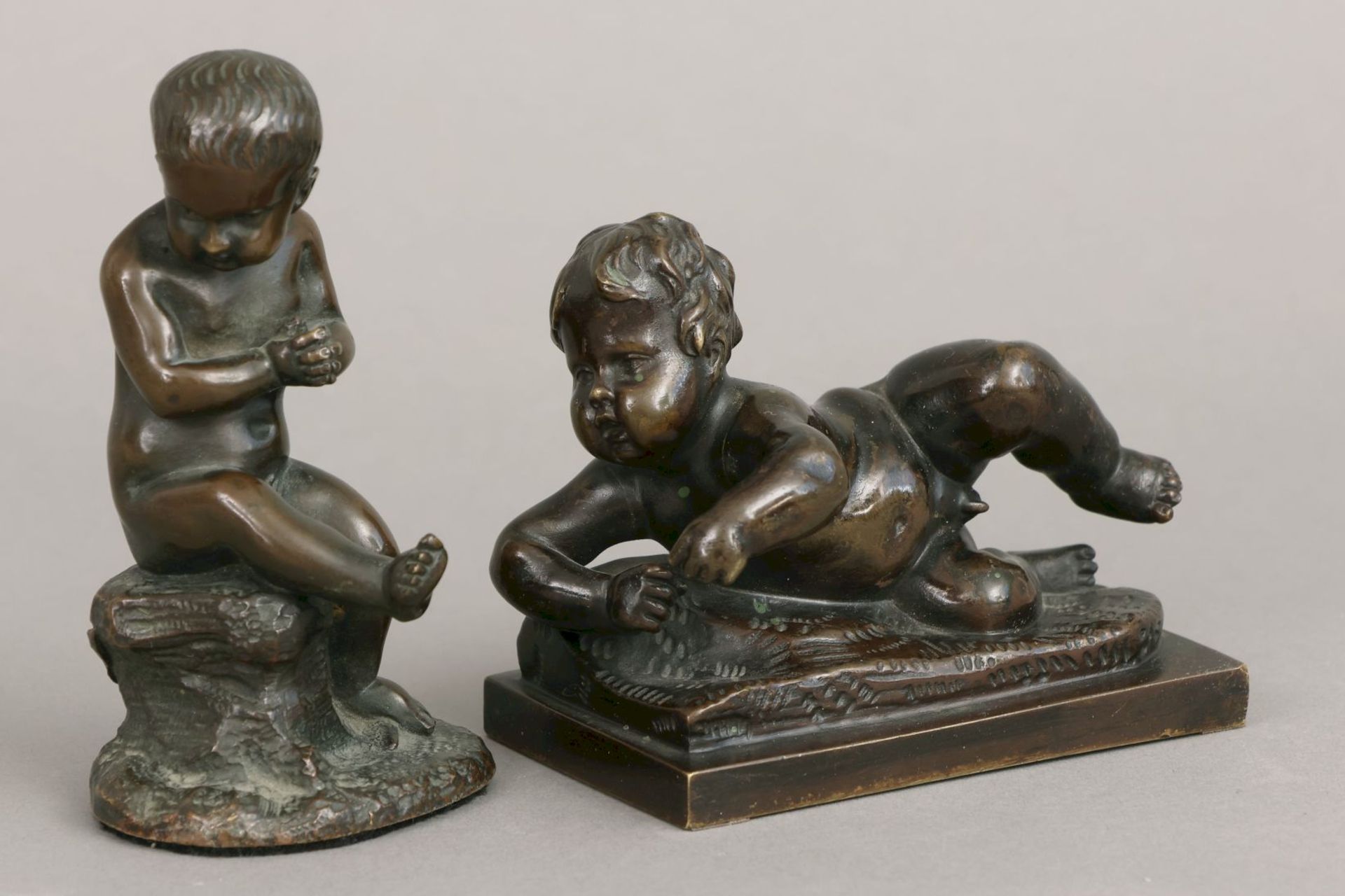 2 Bronze Puttofiguren des 19. Jahrhunderts