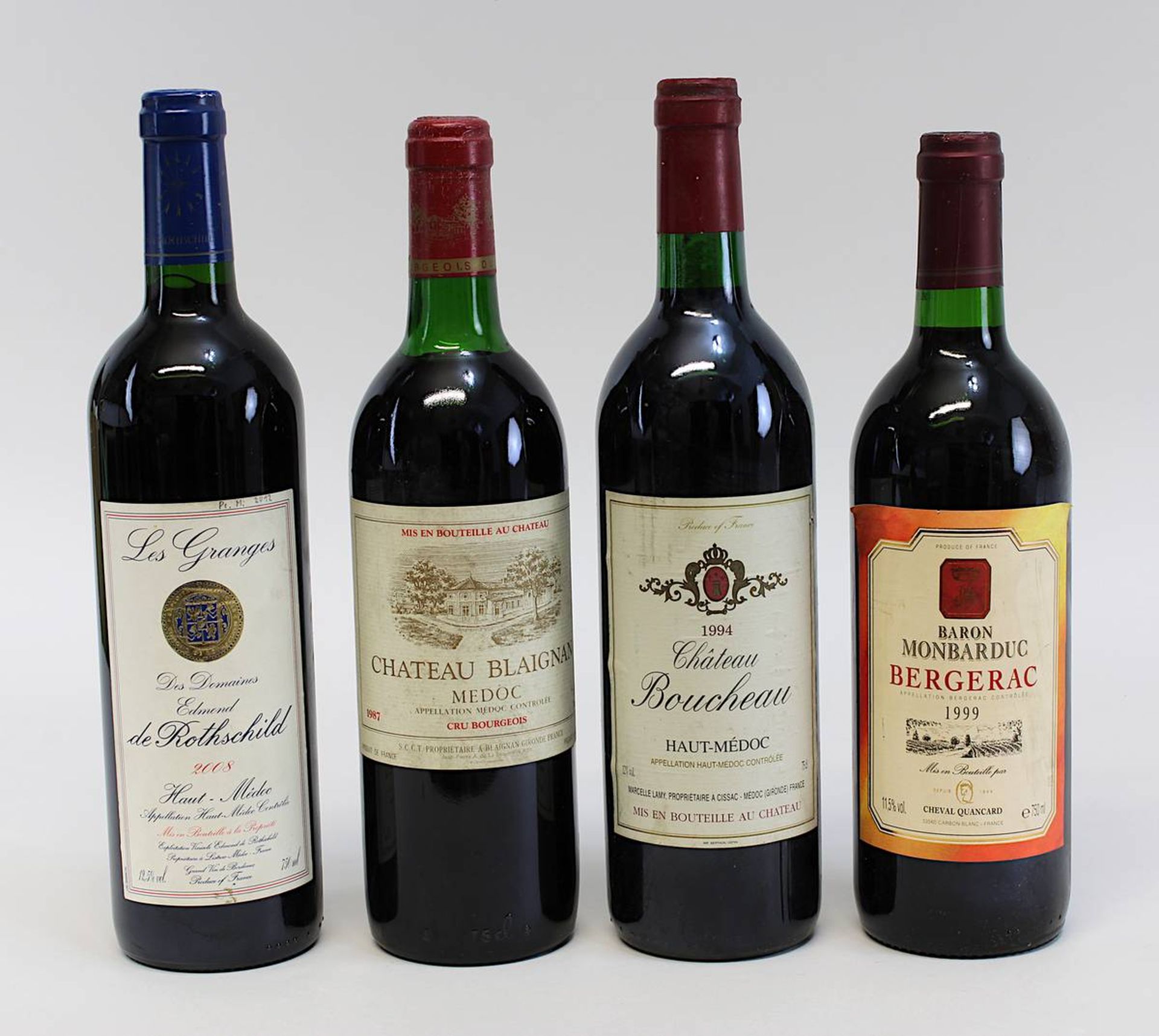 Vier Flaschen Rotwein meist Medoc: eine Flasche 1987er Château Blaignan, Cru Bourgeois, Medoc;
