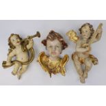 Drei Engelfiguren, 2. H. 20. Jh., im Barockstil, Holz geschnitzt u. gefasst, Putto als