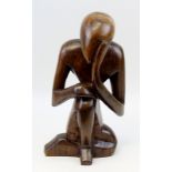 Skulpteur 2. H. 20. Jh., sitzende kauernde Figur aus exotischem Edelholz, mit schöner Maserung,