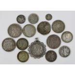 Konvolut von 12 Silbermünzen und einem Anhänger, 17. bis 20. Jh.: Münze zu 8 Reales, Südamerika,