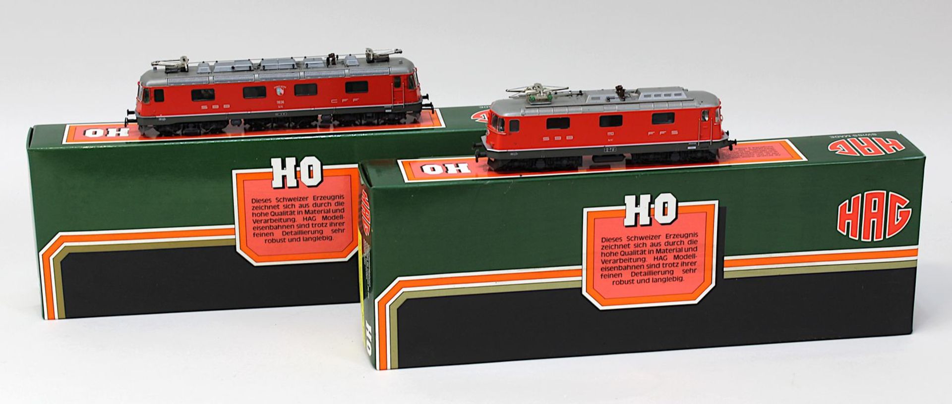 2 HAG E - Loks, Spur H0, Swiss Express Nr. 173 (verklebt mit Schaumstoffresten), SBB rot Nr. 208, in
