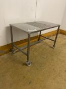 Stainless Steel Mobile Bench, with fitted roller conveyor, approx. 1.4m x 800mm, 480mm wide on