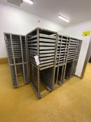 24 Stainless Steel Multi-Tier Mobile Tray Racks, each approx. 760mm x 530mm x 1780mm highPlease read