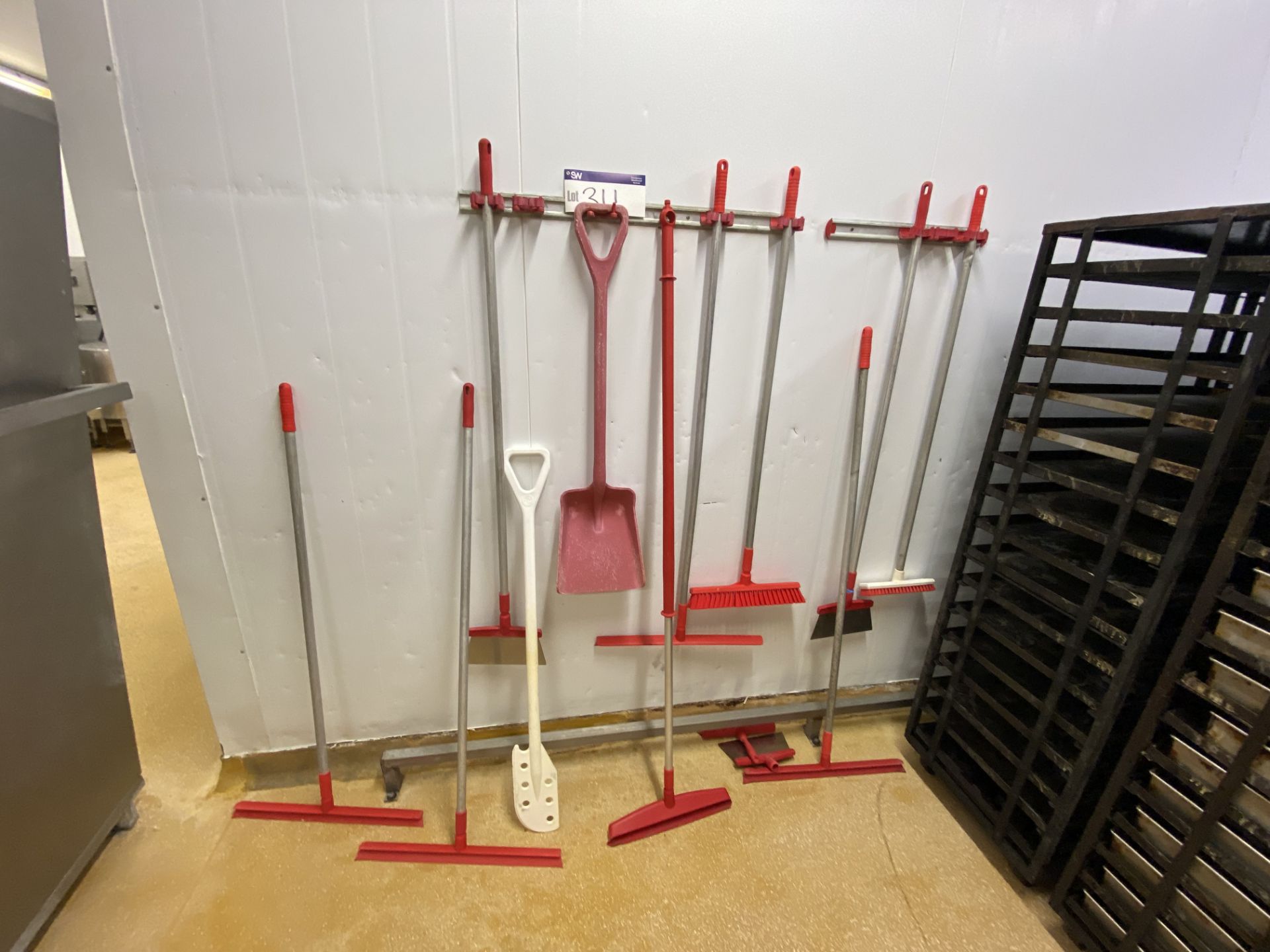 Assorted Cleaning Tools, as set out against wall and on rackPlease read the following important