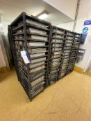 16 Stainless Steel Tray Trollies, with a quantity of stainless steel baking casingsPlease read the