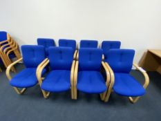 Eight Wood Cantilever Framed Blue Fabric Upholstered ArmchairsPlease read the following important