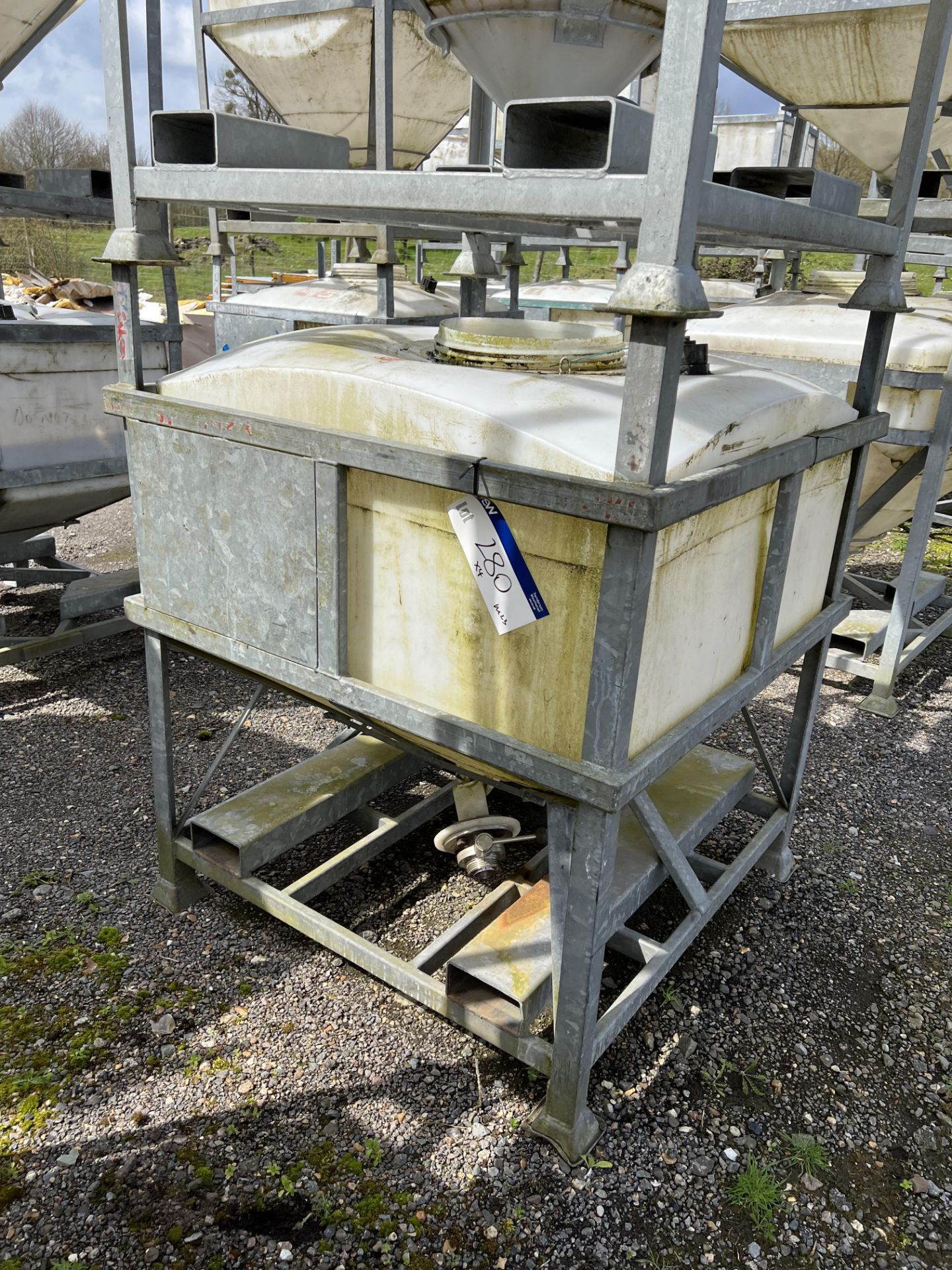 Four IBC Systems Frames, with plastic containers (some with outlet valves fitted), 750 litre - Image 2 of 4